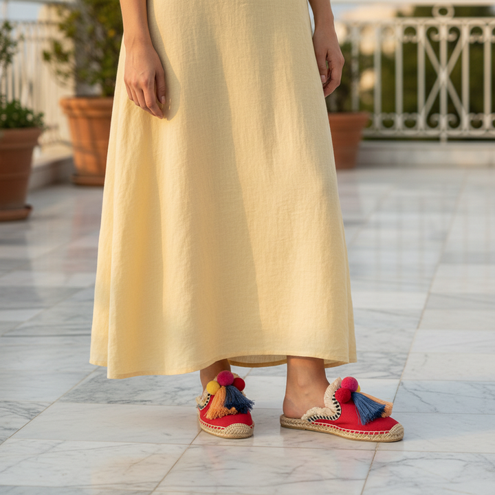 Mules Ibiza À Pompons Tressés