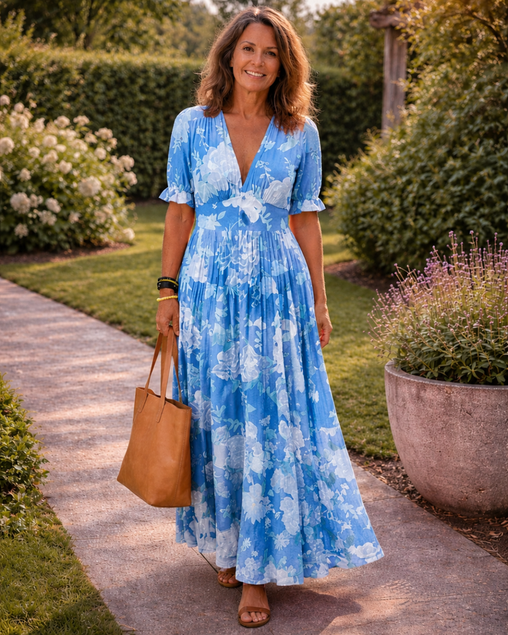 Sabrina | Robe midi à fleurs sans manches avec décolleté en V